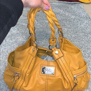 Golden yellow purse. Good condition